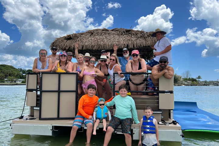 a group of people that are standing in the water
