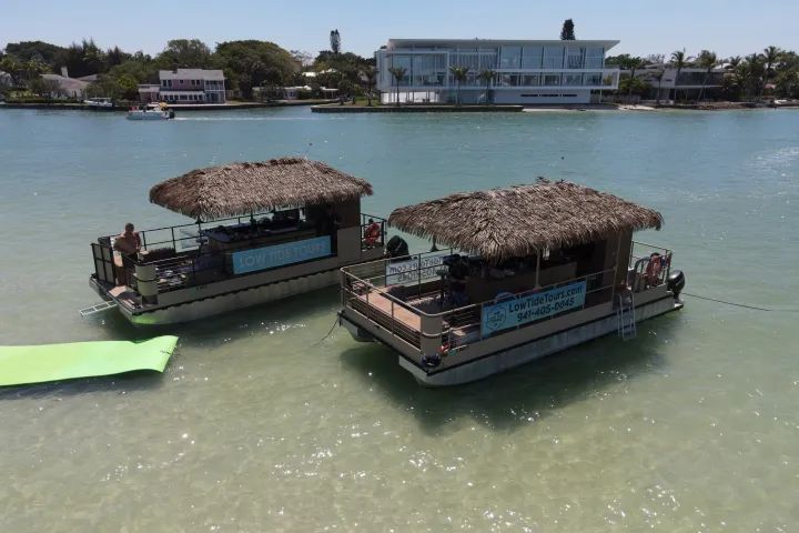 a boat sitting next to a body of water