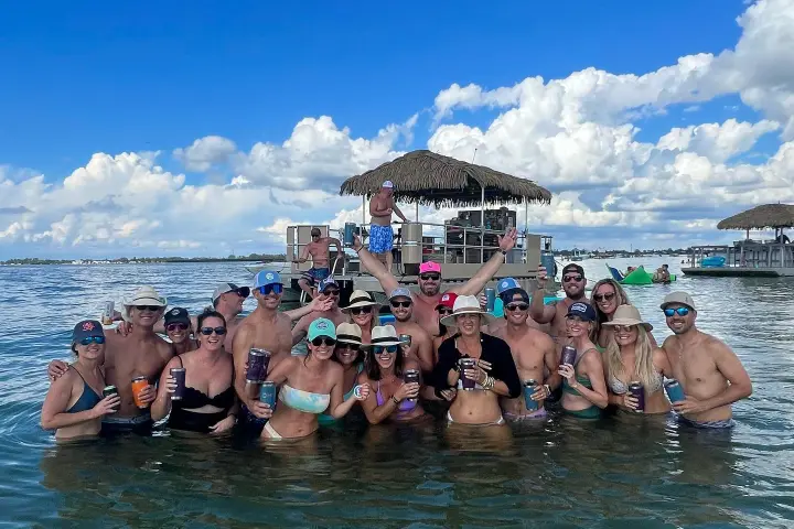a group of people swimming in the water