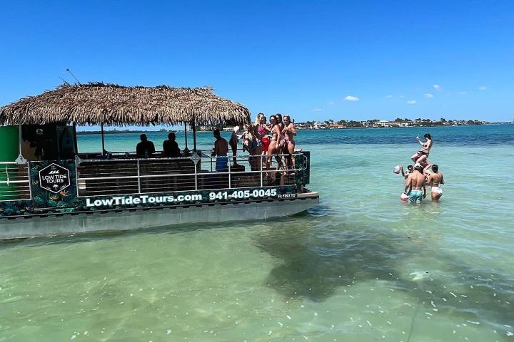 a group of people swimming in a body of water